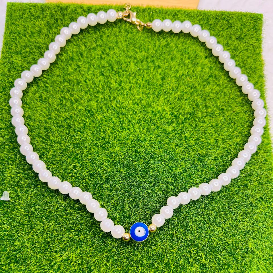 Collar ojito y perlas