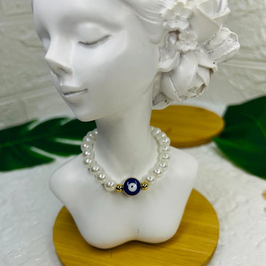 Collar ojito y perlas